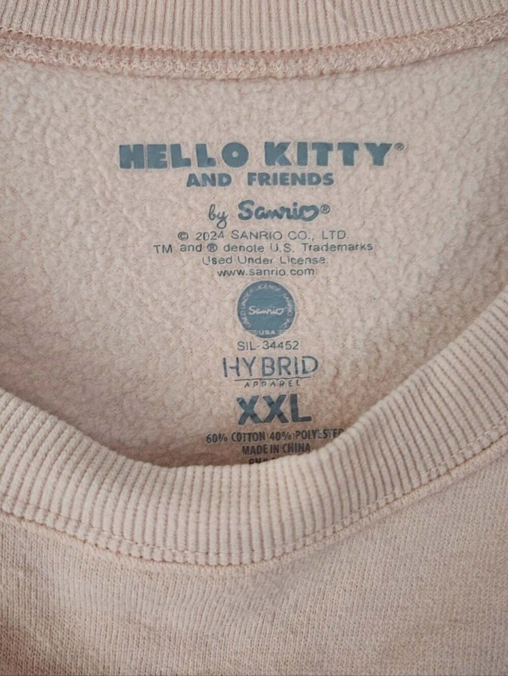 Hello Kitty Peach/Pink Crewneck Sweatshirt with Purple Graphic - Picture 2 of 2